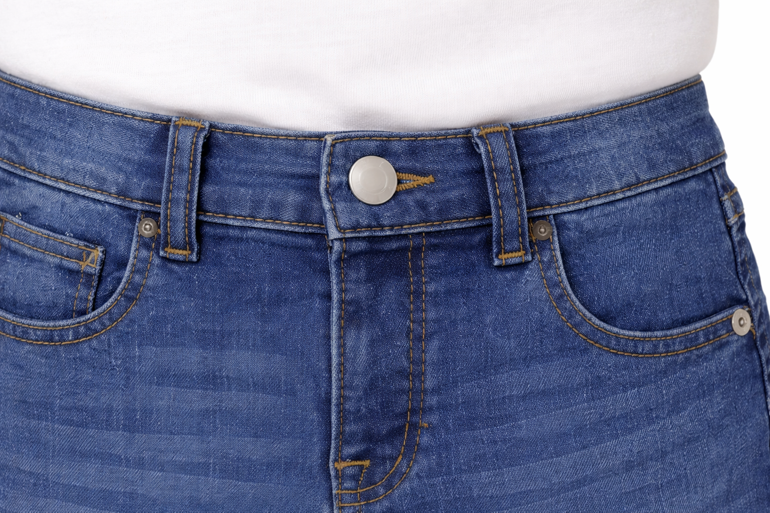 sps-kids-denim-jeans-waistband-button-detail Close-up of blue jeans with a focus on the waistband and pockets.